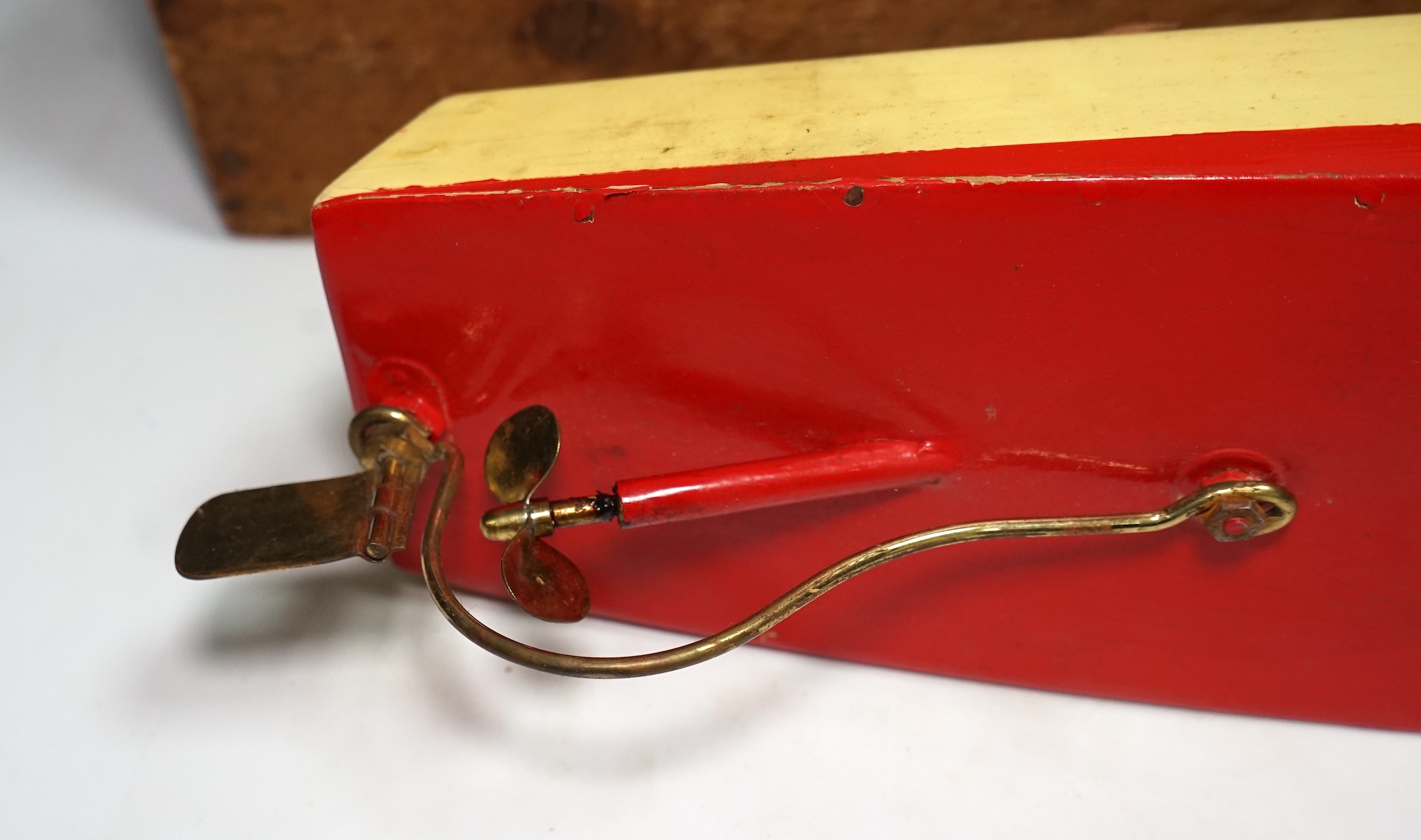 A 1930s wooden boxed Bowman Models live steam speedboat; ‘Swallow’, of wood and tinplate construction, hull 49cm long. Condition - fair.